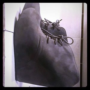 Charcoal gray lace-up wedge booties